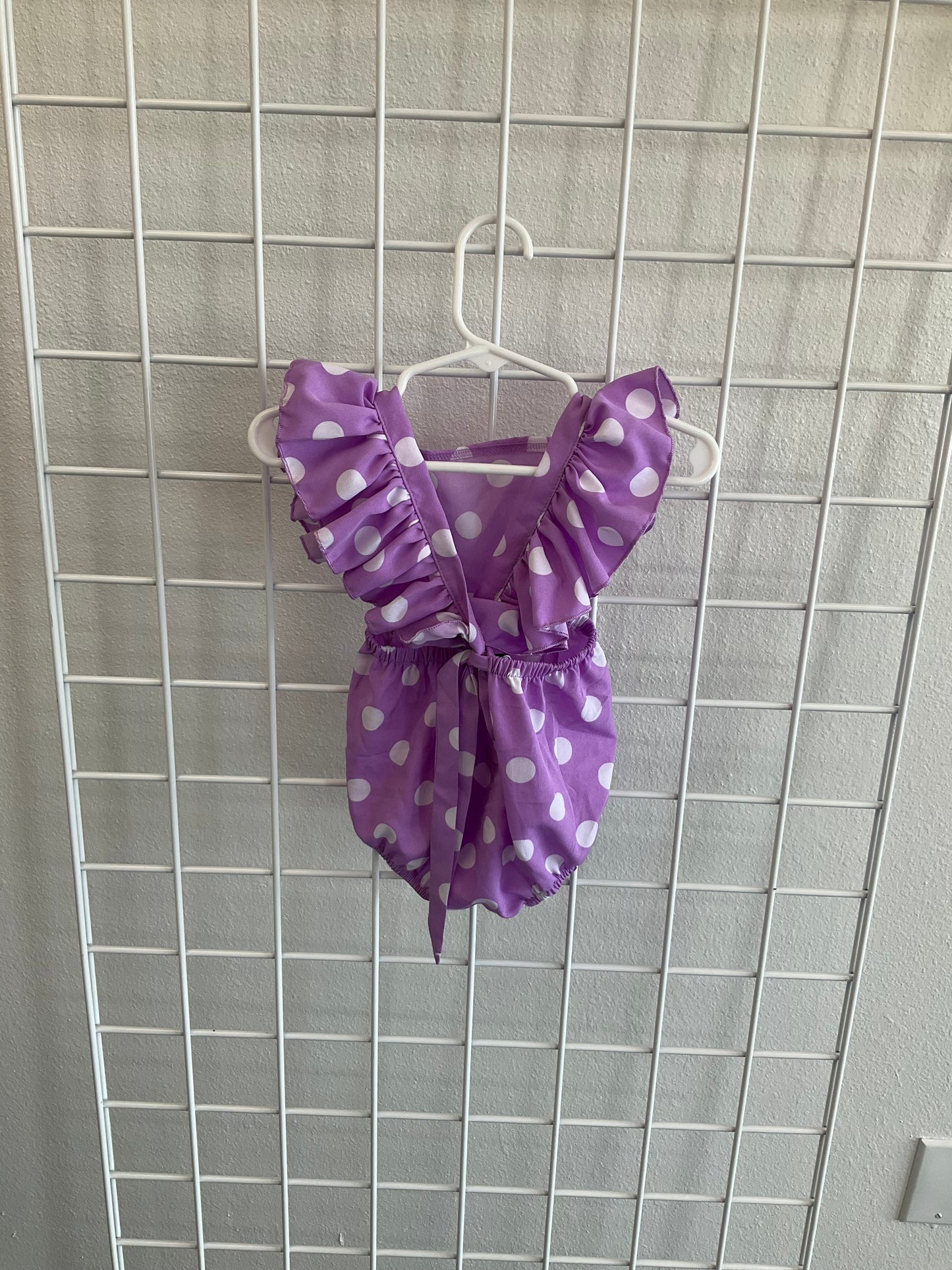 Purple polka dot bubble romper